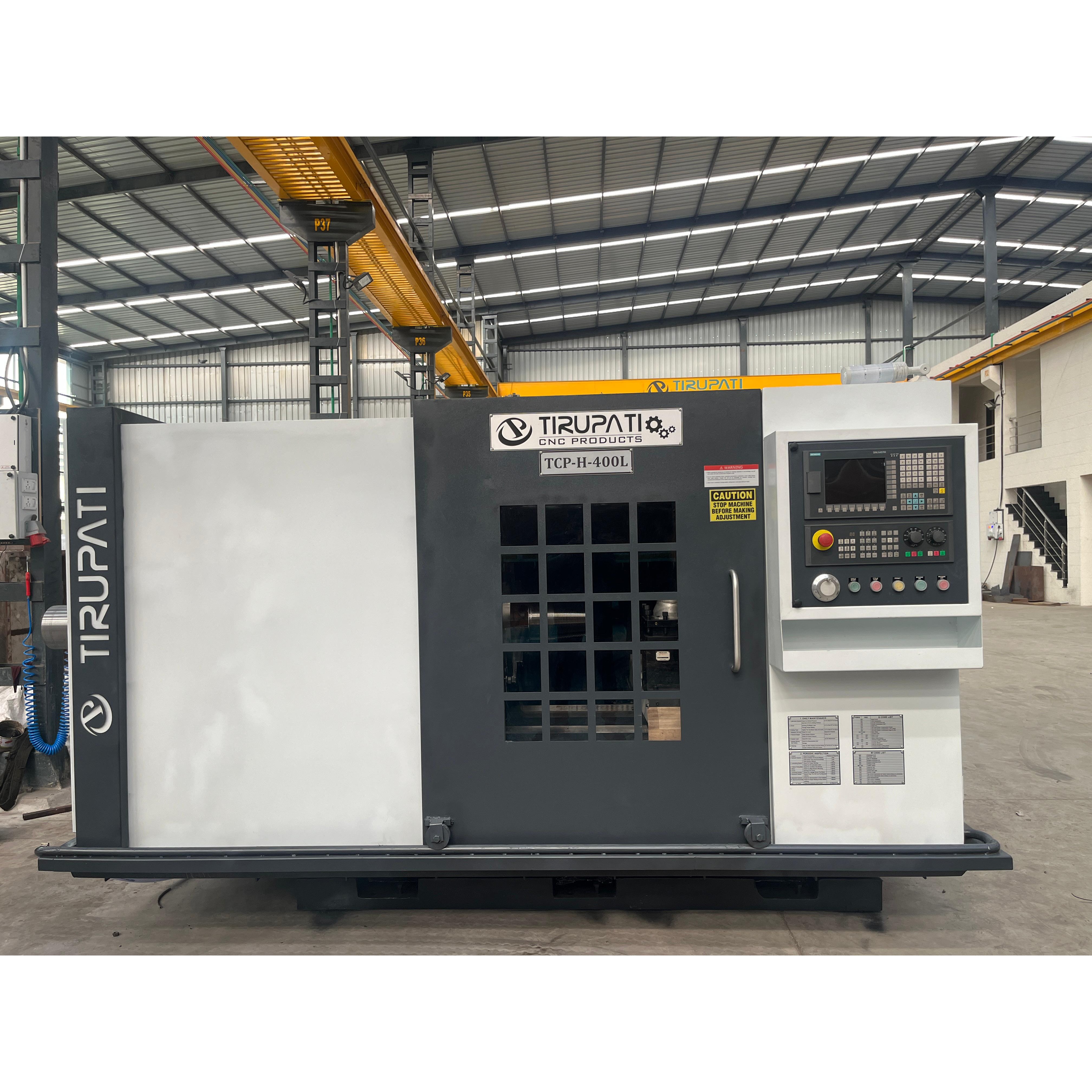 A **CNC Axle Turning Lathe Machine** is a speciali | TIRUPATI CNC PRODUCTS
