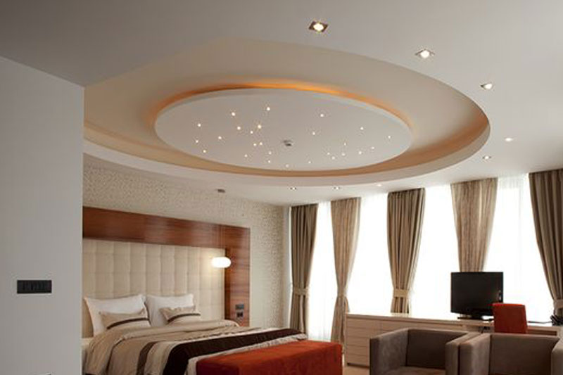 The false ceiling design with concentric circ Pencil Interiors