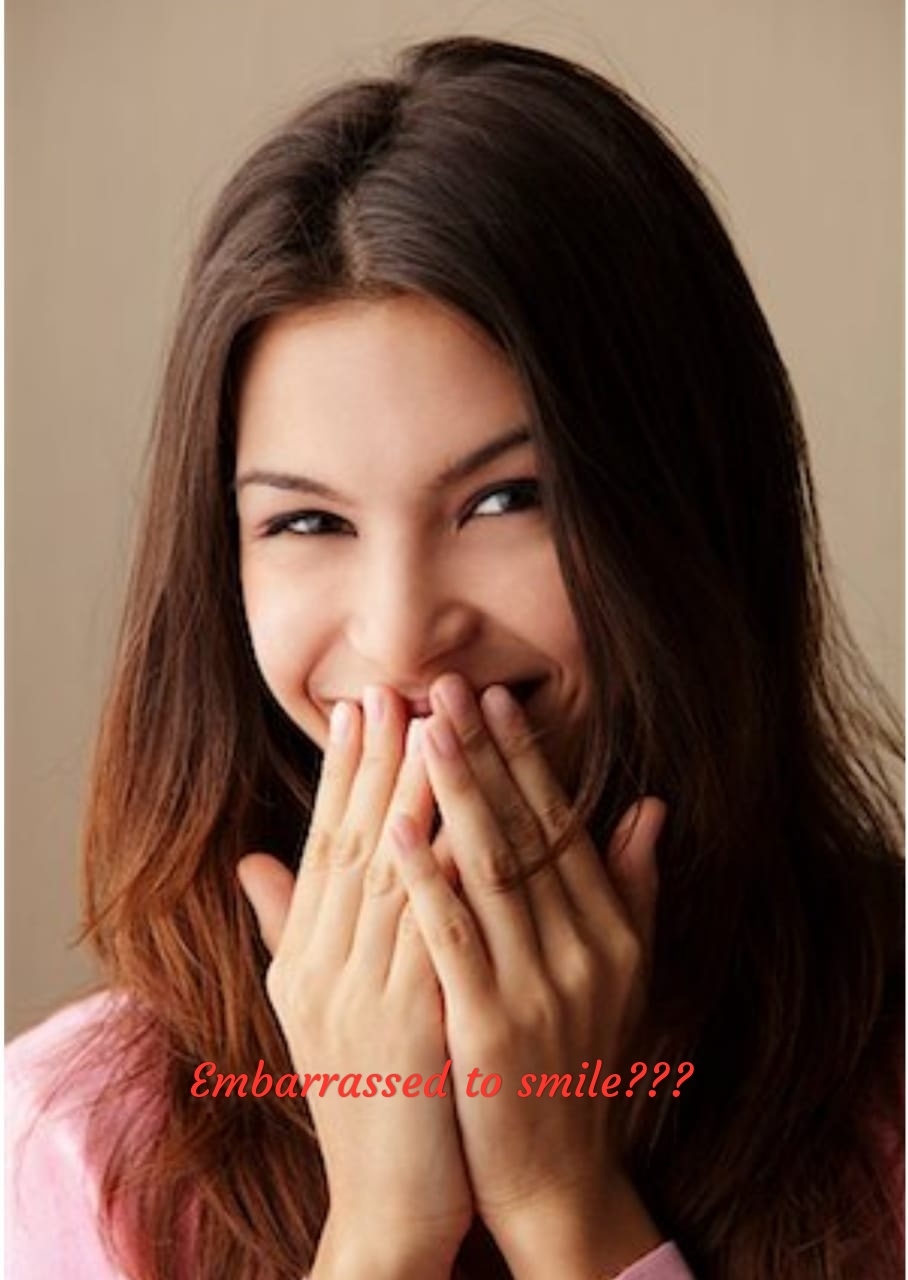 Do you hesitate to smile whenever you want to o... main image