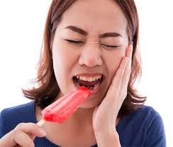 Tooth sensitivity is due to the exposure of den... main image