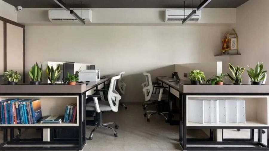 Paired employee workstations interior design
