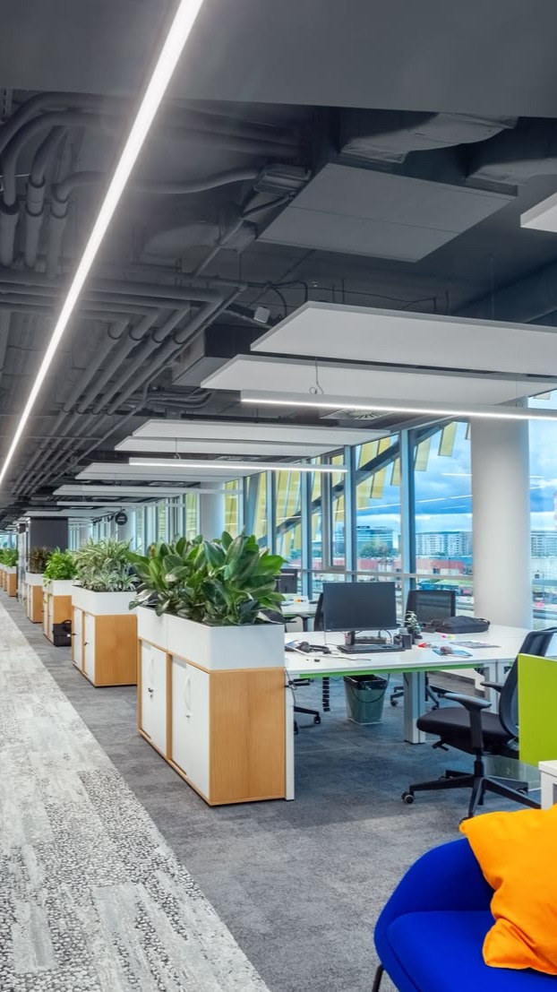 Biophilic Open Office Workspace with Planter Partitions