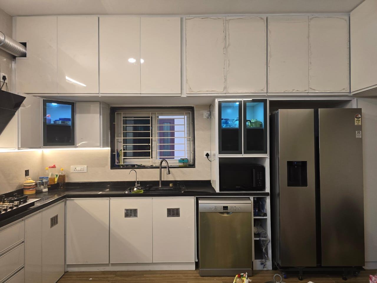 L Shaped Modular Kitchen with Glossy White Cabinets