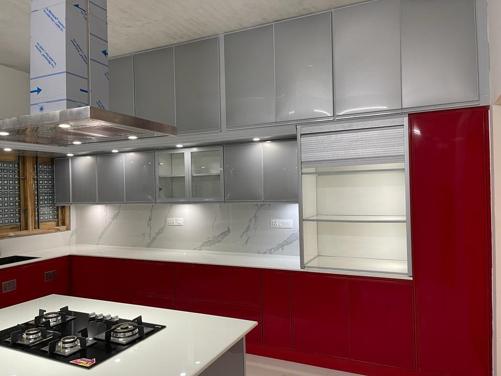 Glossy Red and Grey Modular Kitchen with Marble Finish Backsplash
