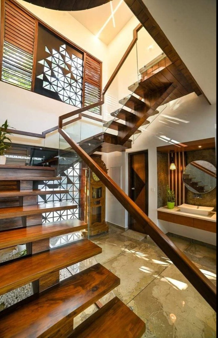 Decorative Window Detailing With Glass Railing And Modern Interior