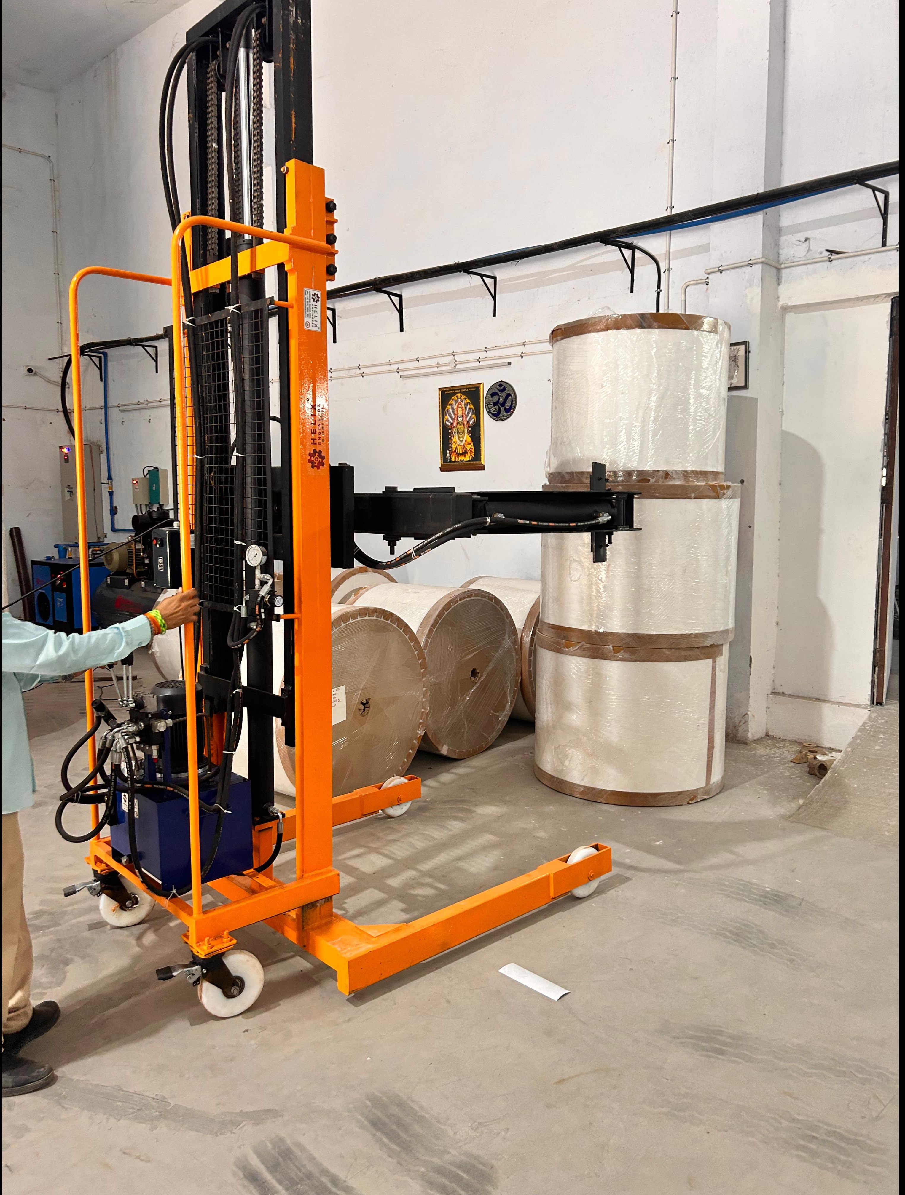 Paper Roll Stacker with Rotating Clamp Manufacturer & Supplier – Helix Engineers