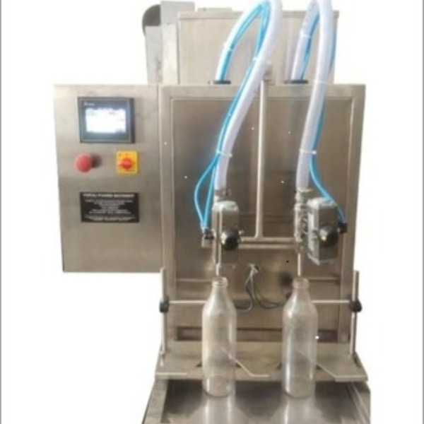 Liquid Filling Machine manufuturing in Ahmedabad, Gujarat, india.