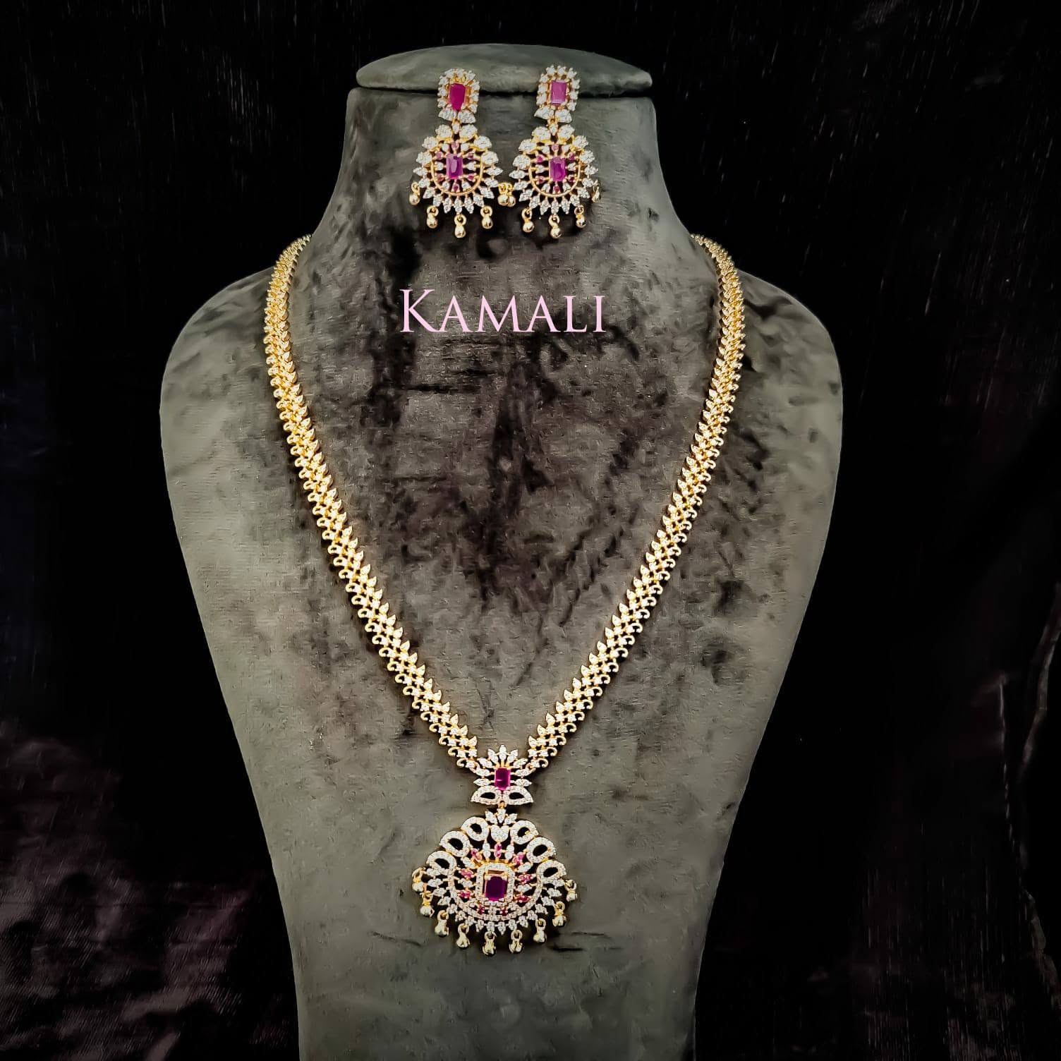 White CZ Stone Long Haram
Artificial Gold Plated Jewellery
Kamali Queen Lazuli Collections
For fu...
