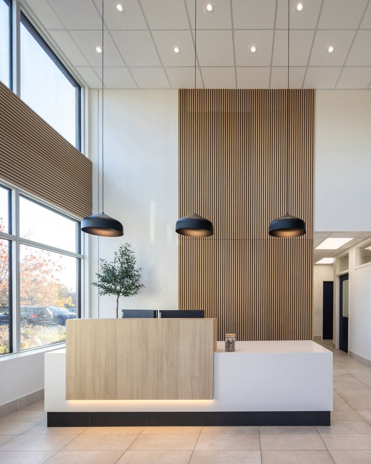 Reception Area Interior Design with Wooden Slat Wall Panelling | Adyar