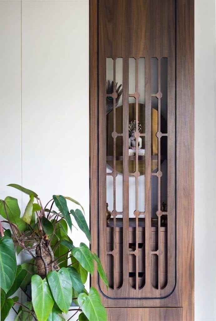 Wooden Pooja Unit Design with Decorative Slatted Doors | Anna Nagar