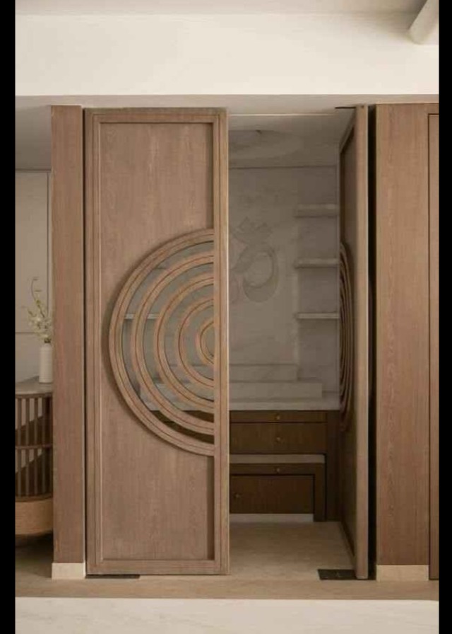 Sliding Pooja Cabinet Design with Circular Wooden Detailing | Anna Nagar