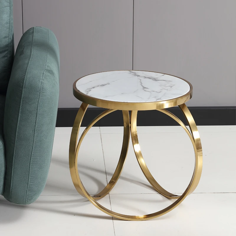 Model No: ST51927Size: 50*55 cmDescription:The base of the side table is designed to resemble bangles or bracelets, which are circular. The base may have a series of circular or curved elements, mimicking the appearance of stacked or interconnected bangles.