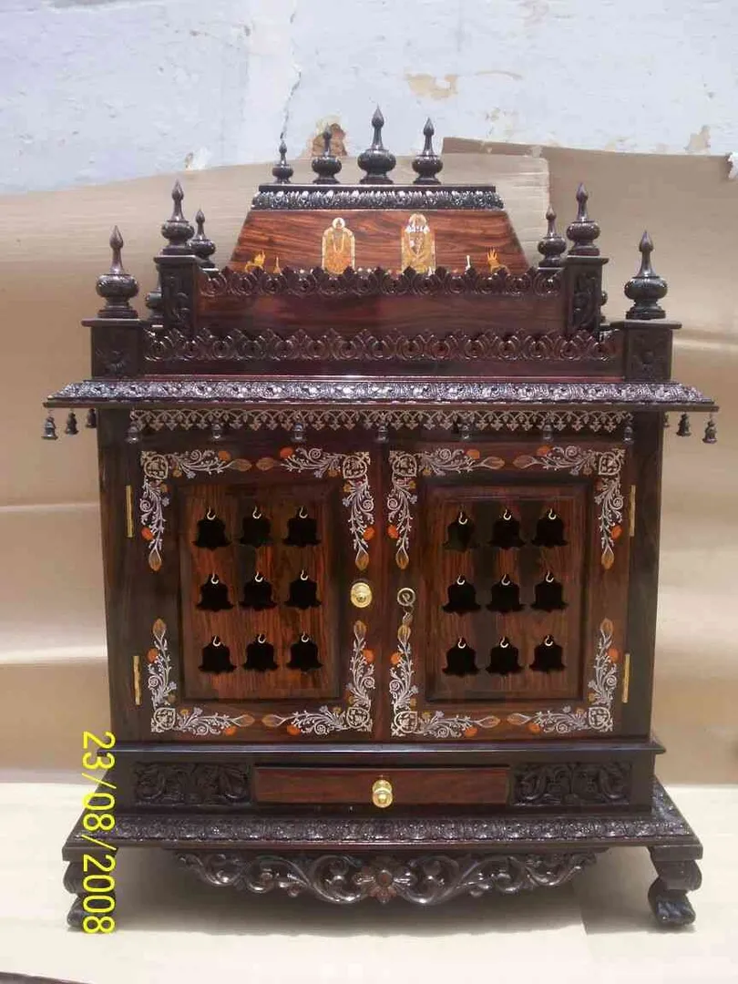 Rosewood Pooja Mandir with inlay work.....
You mad...