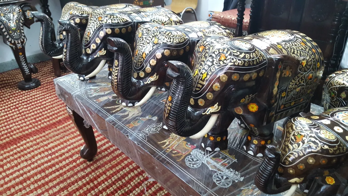 Rosewood Brass Inlaid Elephants all natural metal...