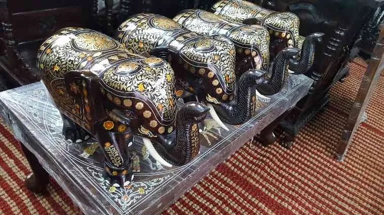 Rosewood Brass Inlaid Elephants all natural metal...