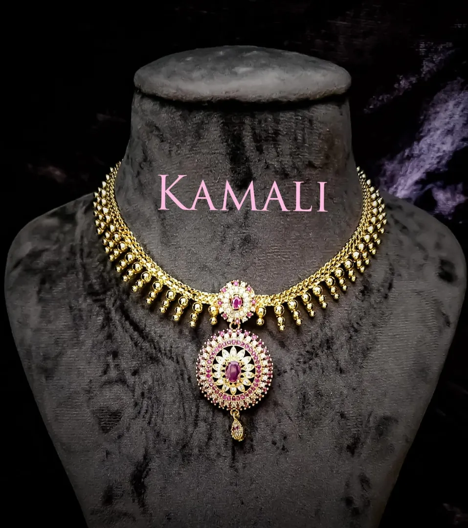 AD White and Red Stone Necklace
American Diamond...