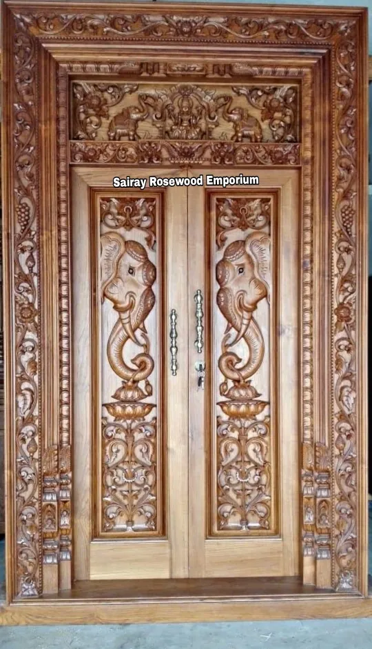 Teak wood main Door with Vaskal
Elephents Carvin...