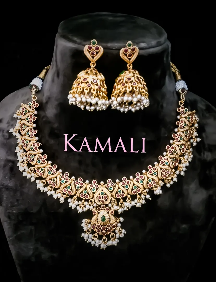 Gold Plated Antique Necklace with Pearl Dangles.
...