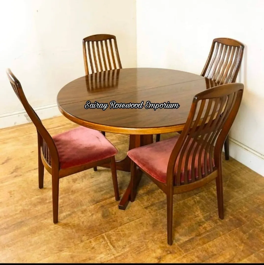 Rosewood Dinning table
With 4 Chairs
In morden l...