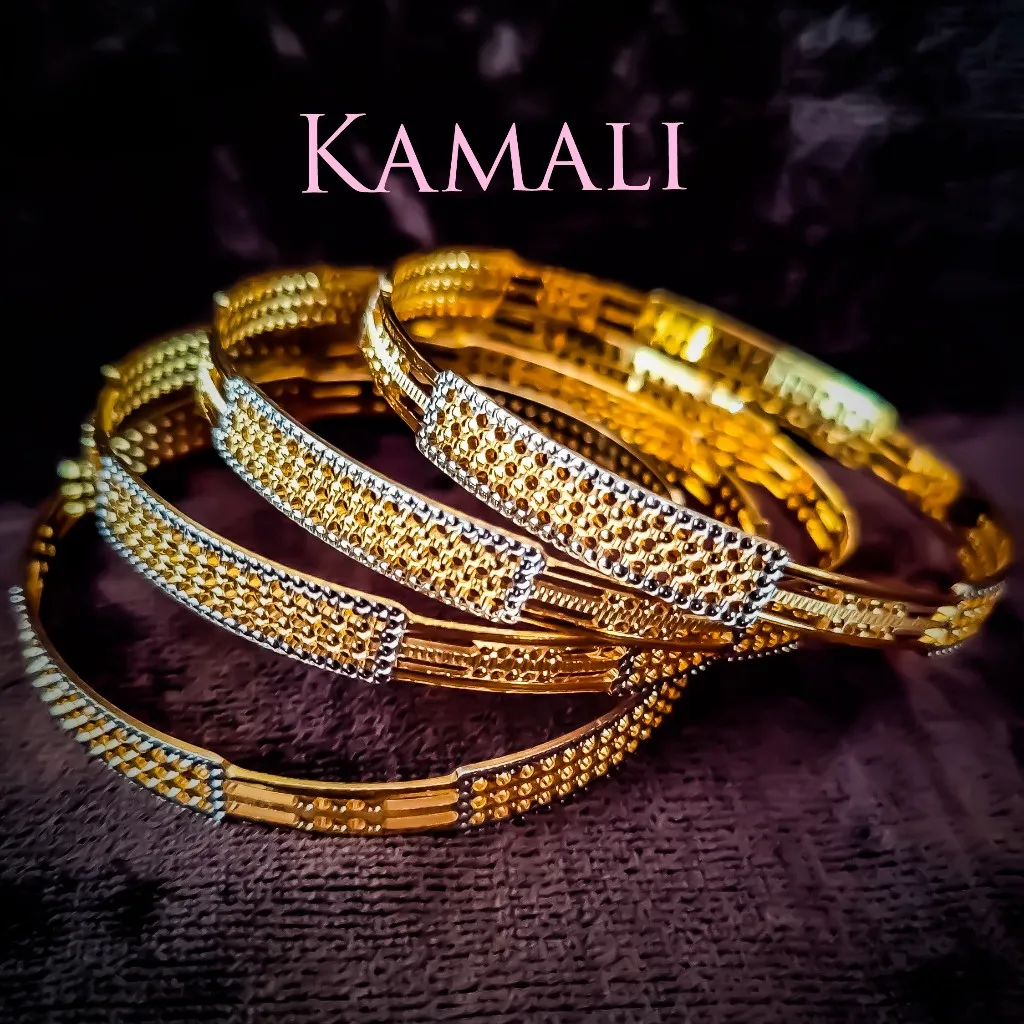 Rhodium Plated Gold Mixed Bangles
Artificial Gold...