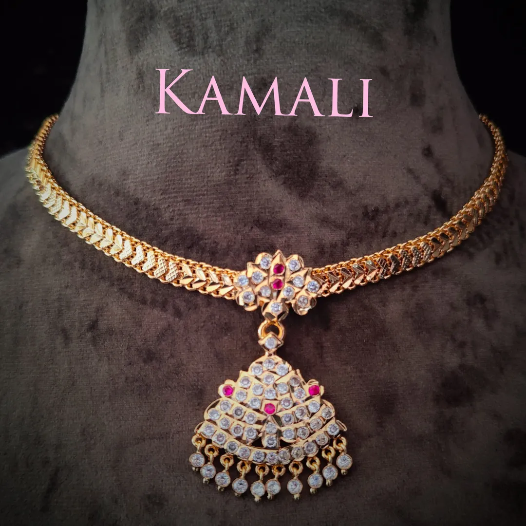 Impon Attigai Necklace
Thayir Kari Necklace
Hand...