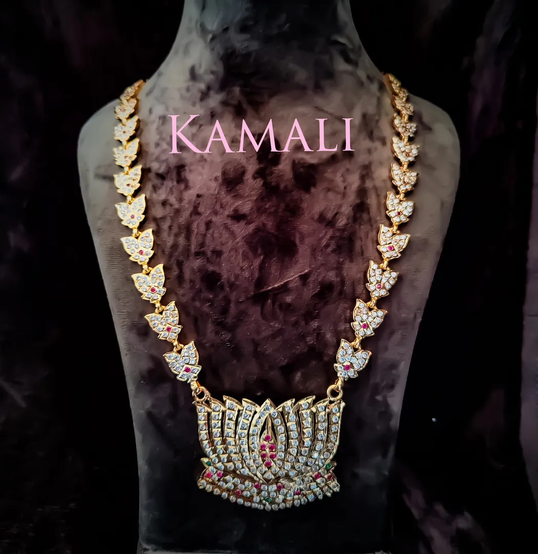 Impon Haram with Lotus Dollar Pendant
Hand crafte...