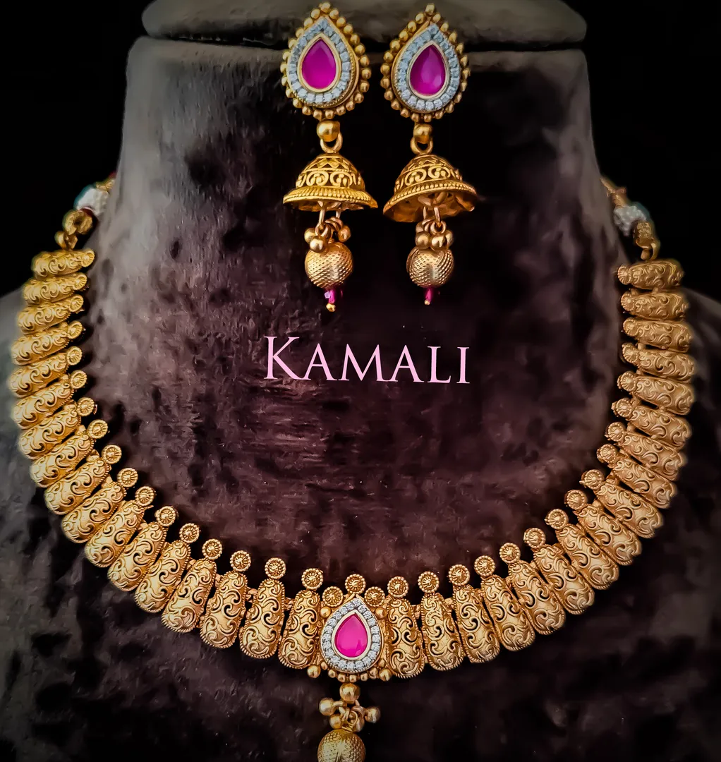 Kundan Necklace Set with Jumkkas
Kamali Queen Rad...
