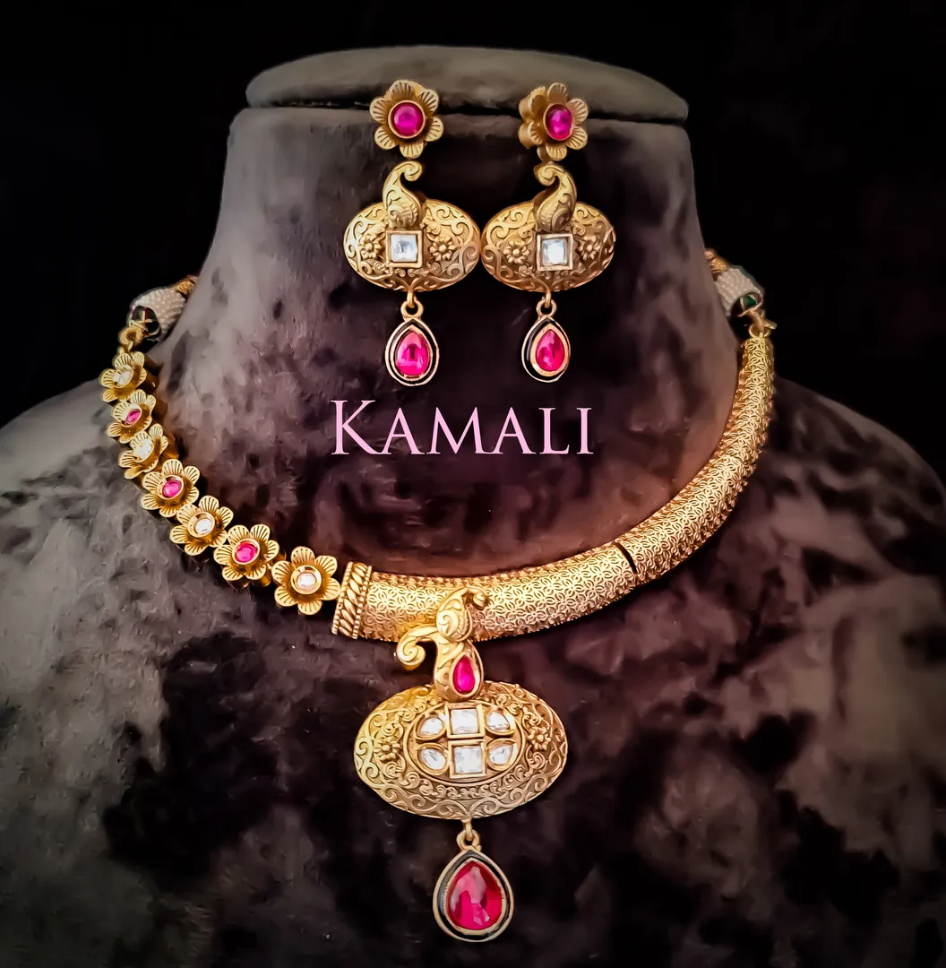 Kundan Necklace Set with Jumkkas
Kamali Queen Rad...