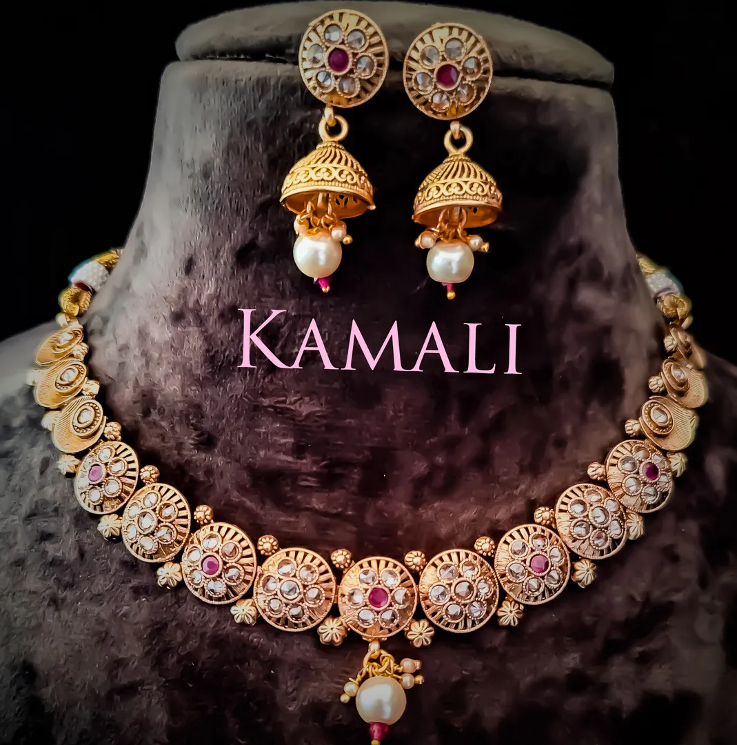 Kundan Necklace Set with Jumkkas
Kamali Queen Rad...