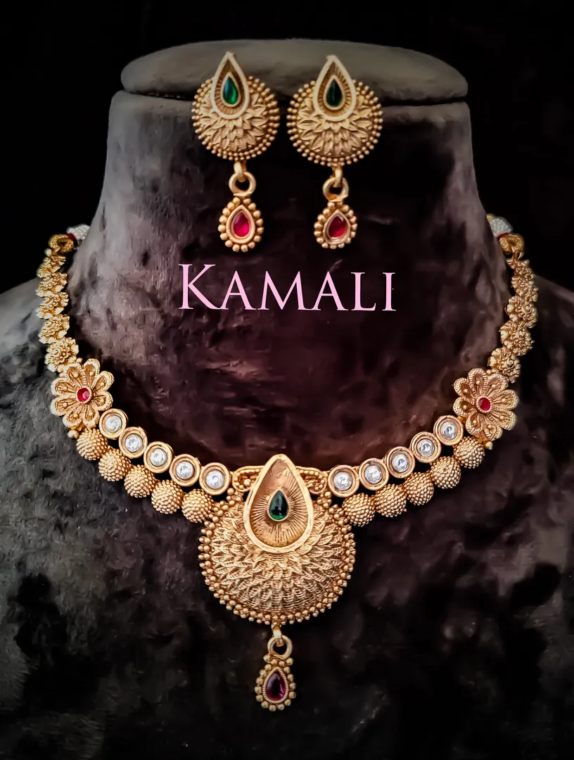 Kundan Necklace Set with Jumkkas
Kamali Queen Rad...