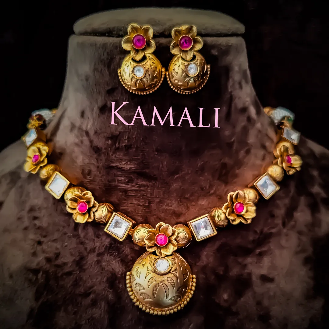 Kundan Necklace Set with Jumkkas
Kamali Queen Rad...
