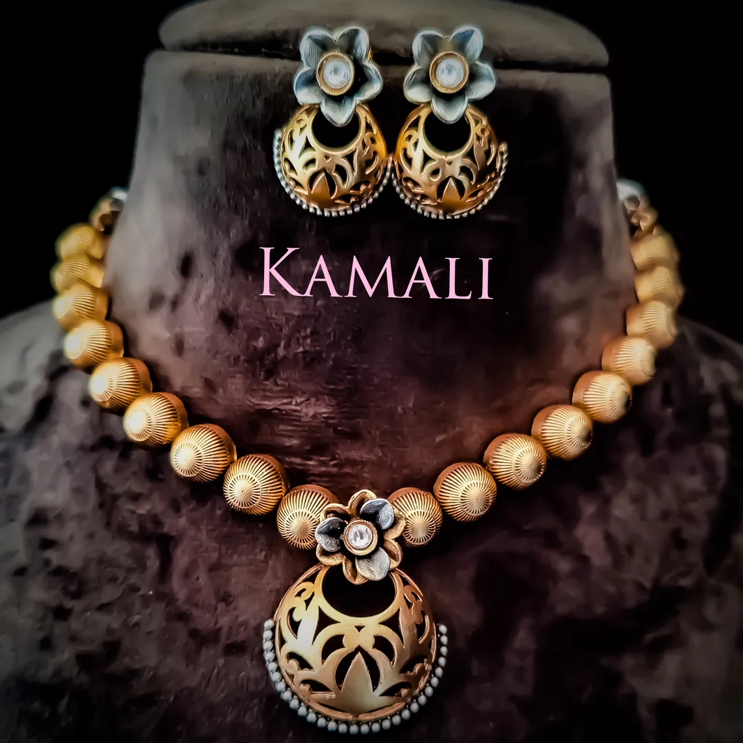 Kundan Necklace Set with Jumkkas
Kamali Queen Rad...