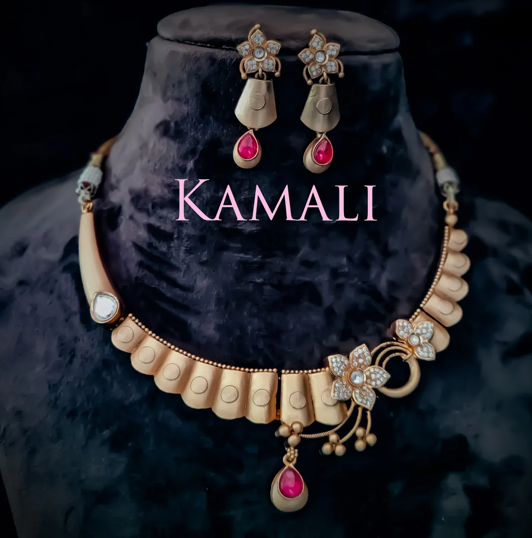Kundan Necklace Set for Women
Adorned with Kempu ...