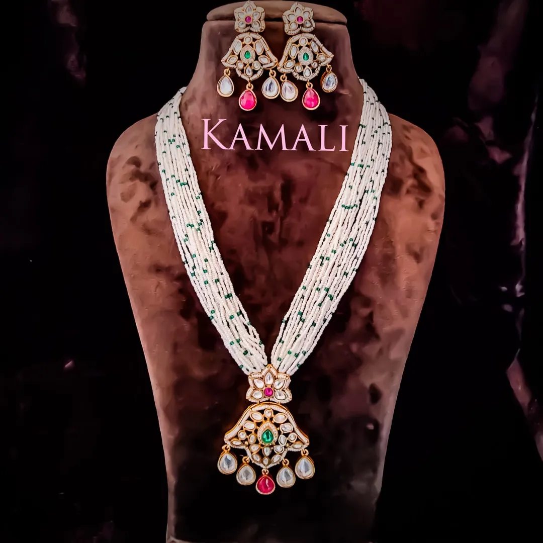 Pearl Long Haram with Kundan Pendant Set
Adorned ...