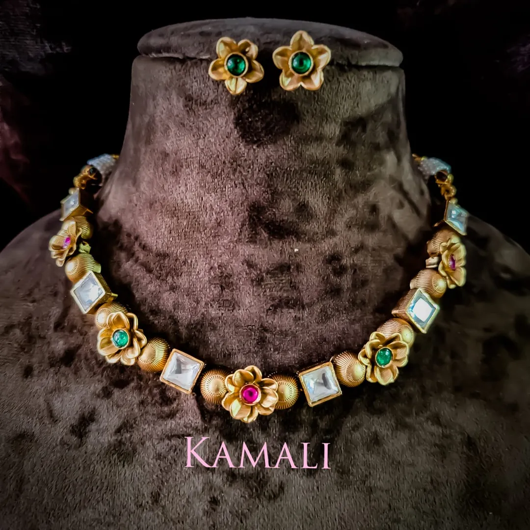 Kundan Jewellery Set with Jumkkas
Radiance Jewell...