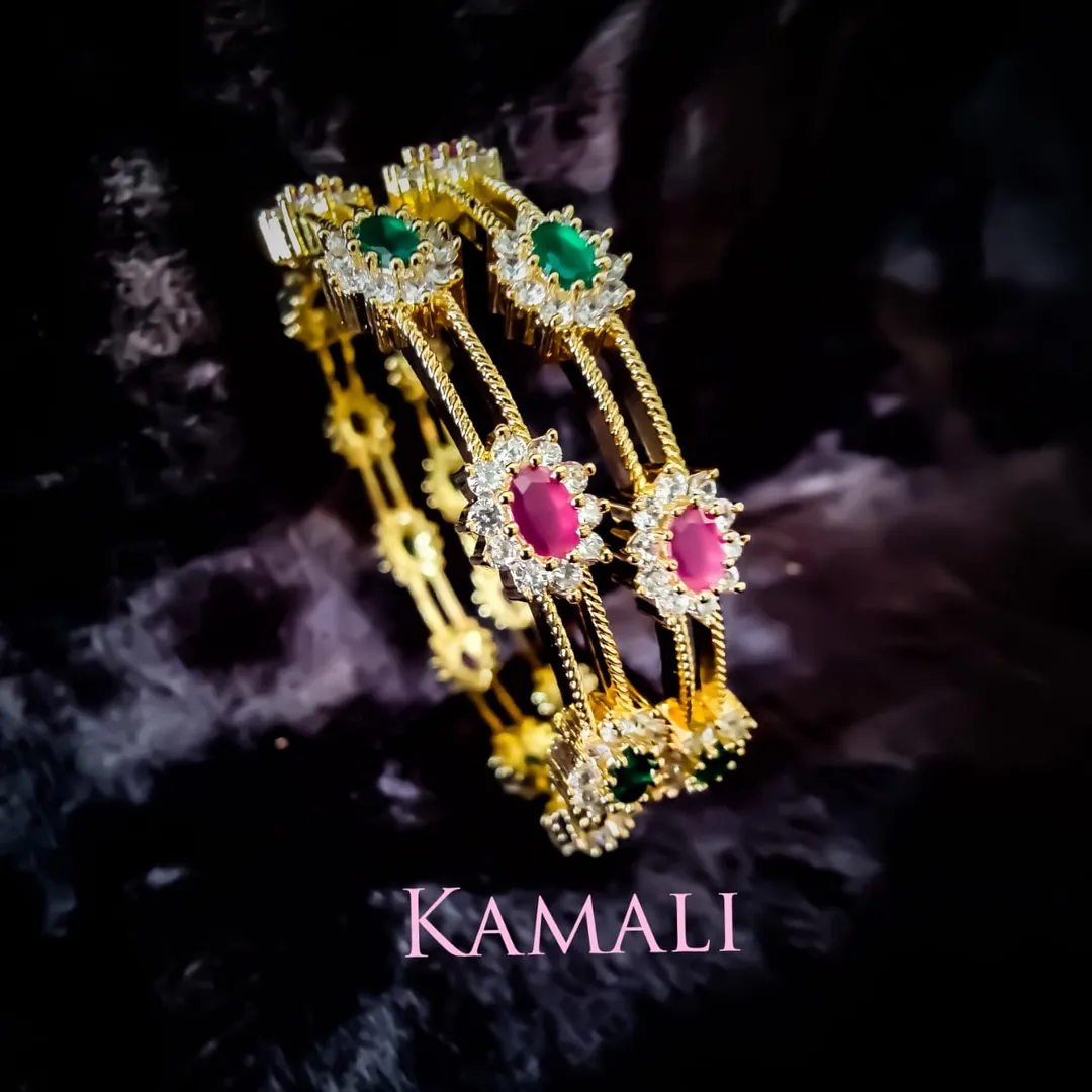 CZ and Kempu Bangles Collections
Artificial Gold ...