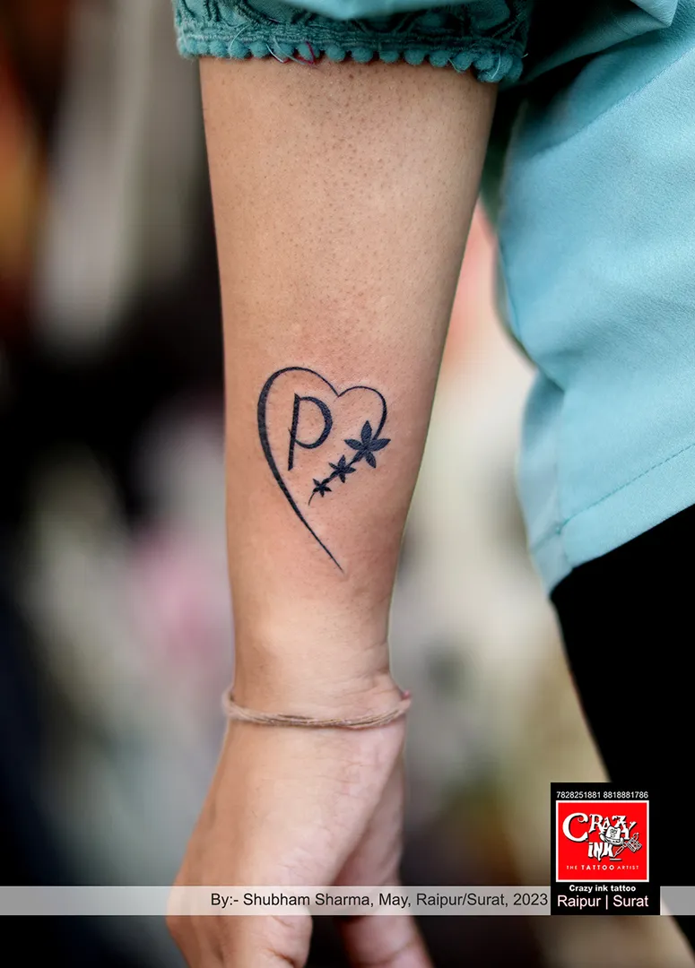 APHABET WITH HEART TATTOO DESIGN
By:- tatt...