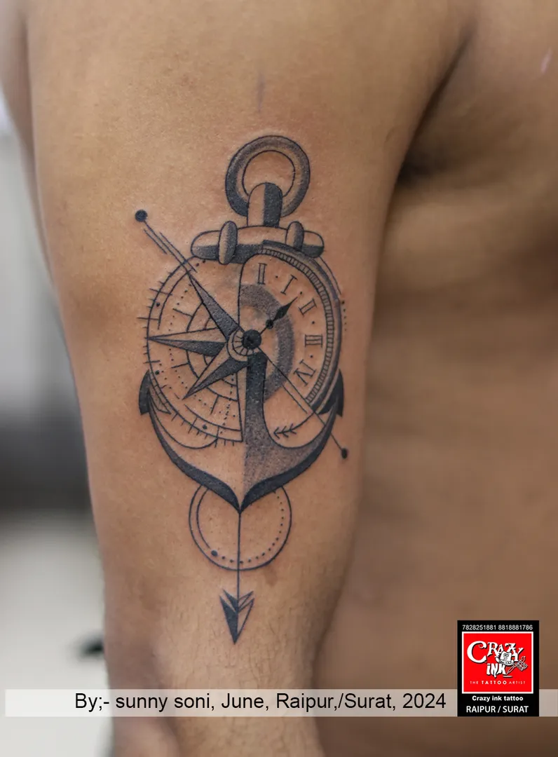 COMPASS WITH ANCOR TATTOO DESIGN
The compass and...