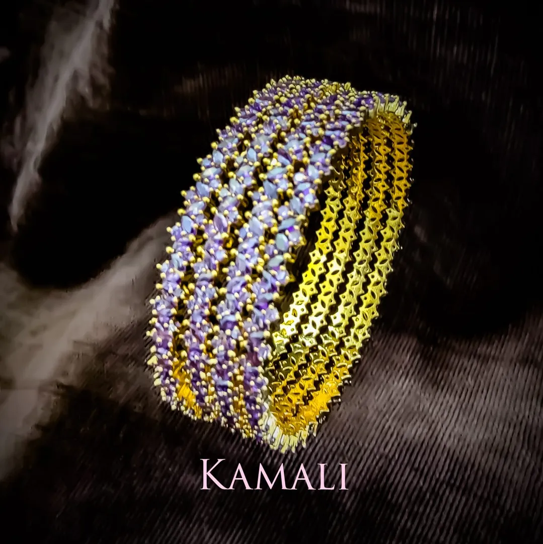 Violet Stone Bangles
Artificial Gold Plated Jewel...
