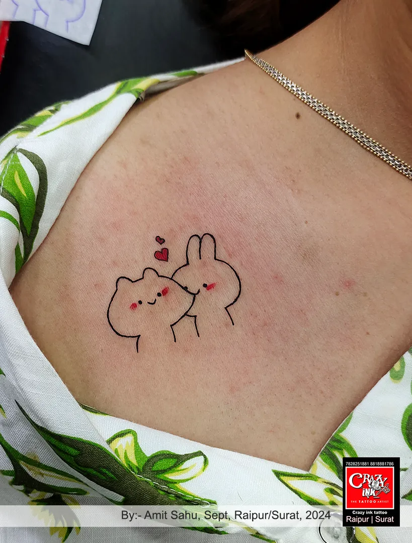 THIS TATTOO IS AN ADORABLE DEPICTION OF LOVE AND C...