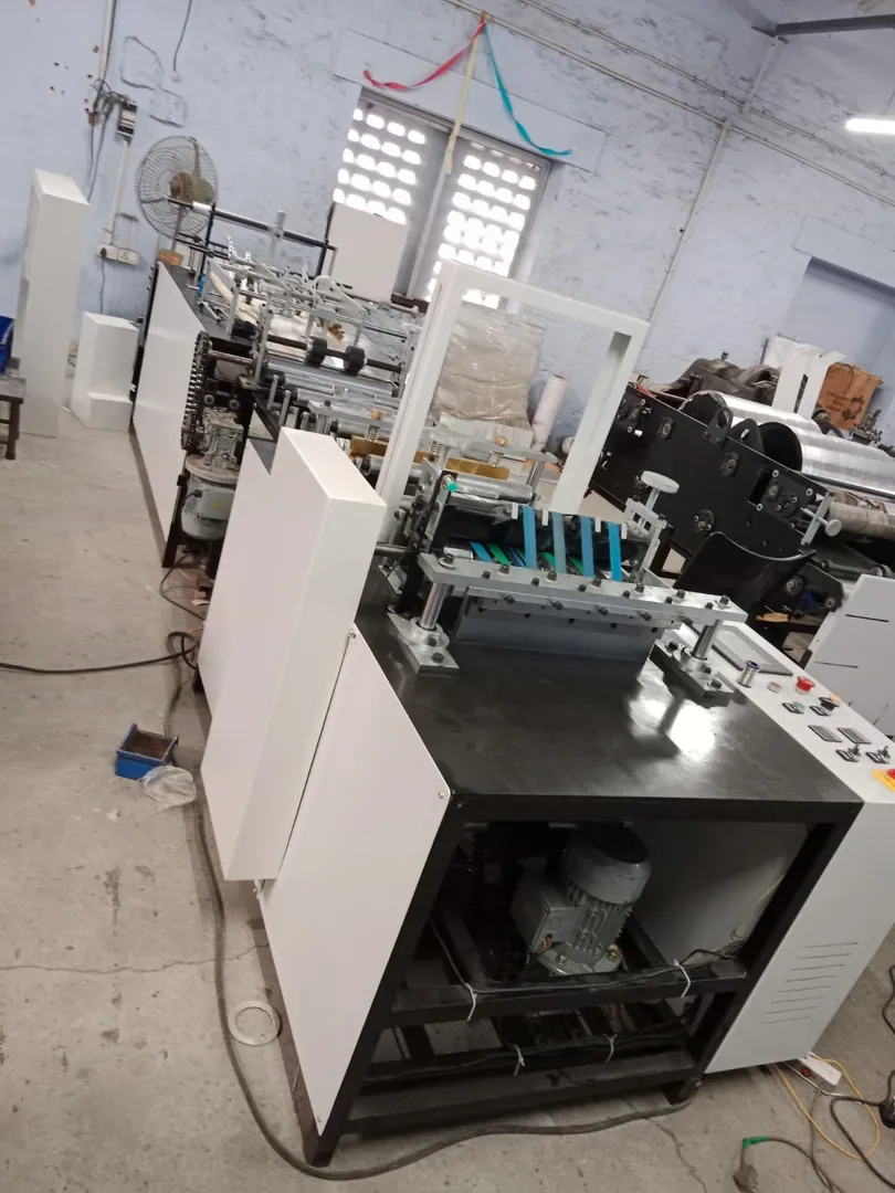 JJ Mark Aluminium foil pouch making machine/Silver...
