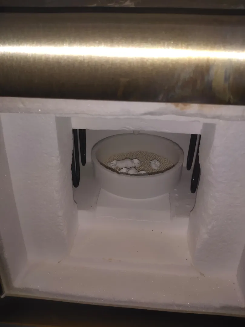 Dental caps milled and ready for sintering. Overni...