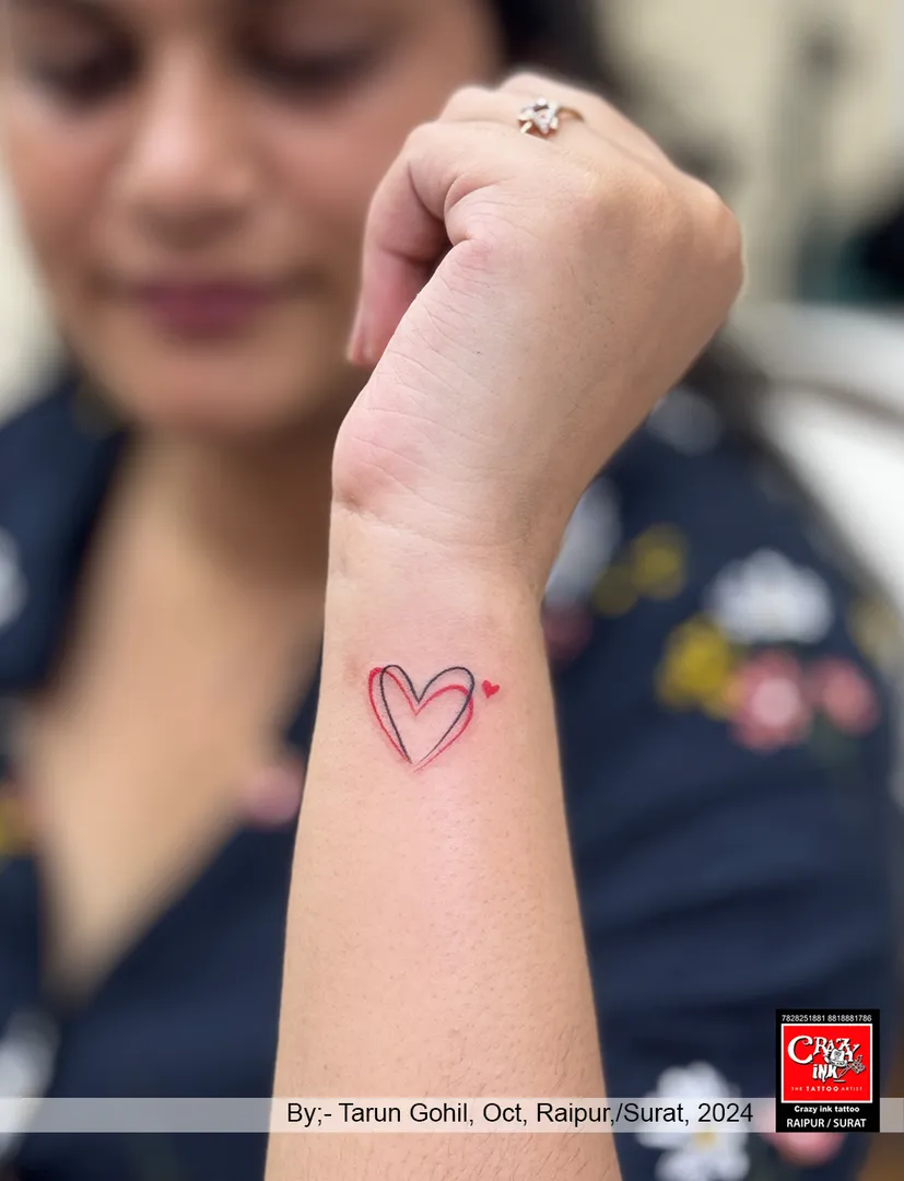 DELICATE HEART LINE ART TATTOO ON WRIST
This...