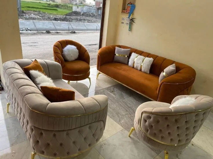 An Elegant Chester Sofa, often referred to as a Ch...