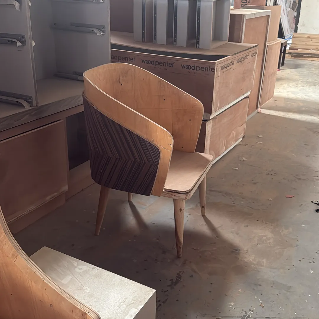 Customised dining chairs with veneered backs are a...