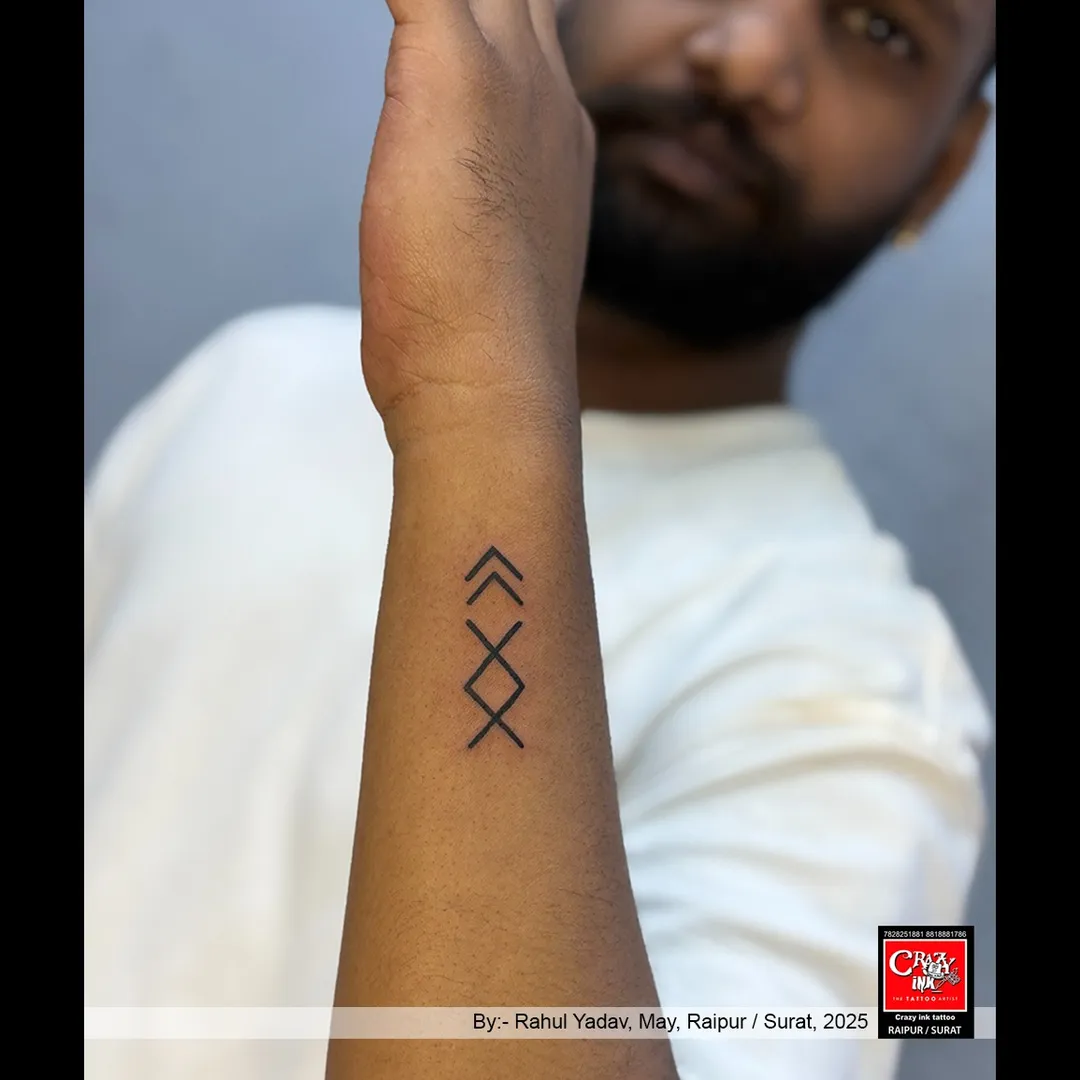MINIMALISM SPEAKS LOUDER THAN WORDS.
This geometric tattoo isn't just a design—it's a symbo...