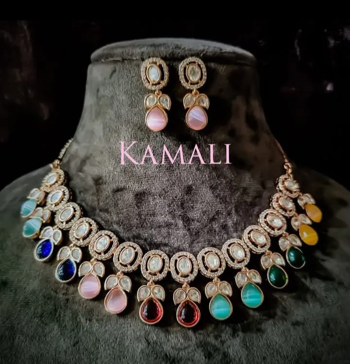 Victorian Mozanite Kundan with multi color stones
Artificial Gold Plated Jewellery
Kamali Queen Ra...
