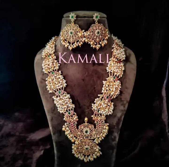 Pearl Antique Haram
With Lotus Kemp Motifs
Exclusive Antique Jewellery Collections
Artificial Gol...