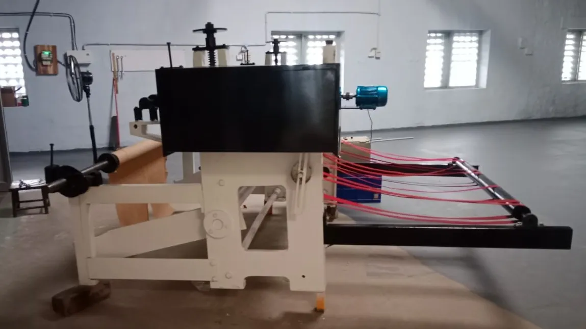Roll to sheet cutting machine
