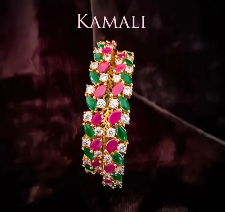 All time favorite Bangles
CZ, Ruby and Emerald Stones Bangles
Artificial Gold
Kamali Queen Lazuli...